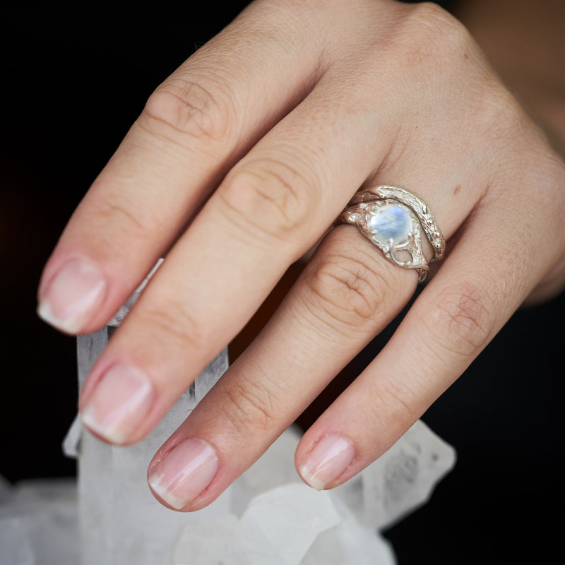 Moonstone ring set "Ariel" on the hand