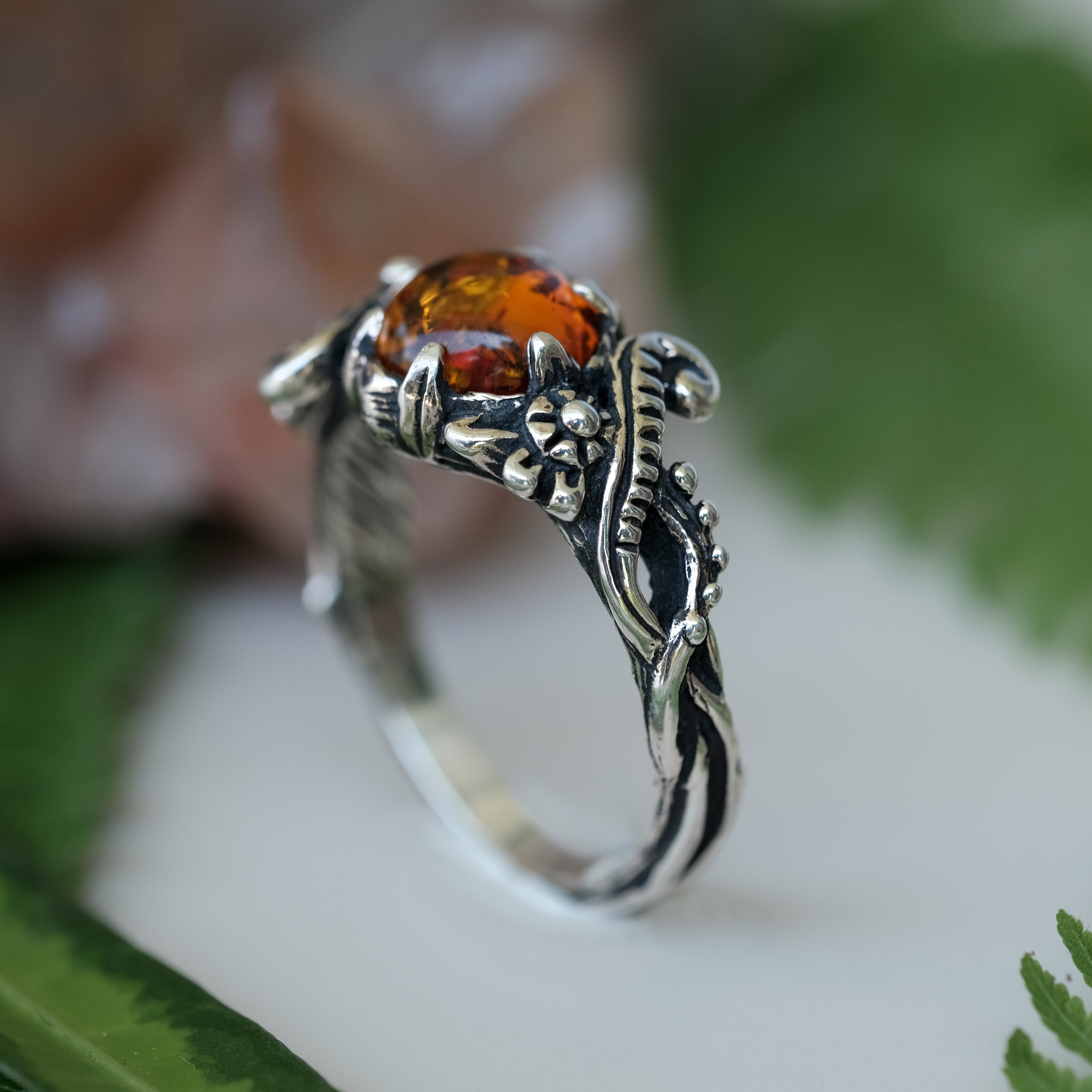 Balinese Jungle Ornament Silver ring with Amber 