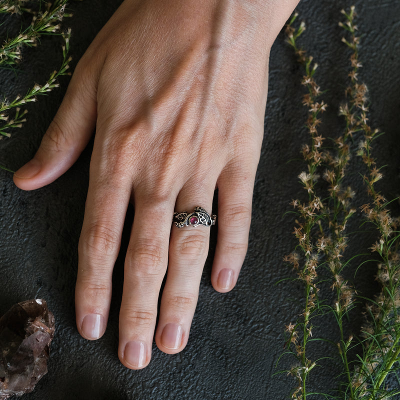 Silver ring with Ruby on hand