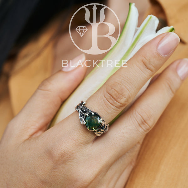 Women's Ring “Sierra'' With Moss Agate on hand