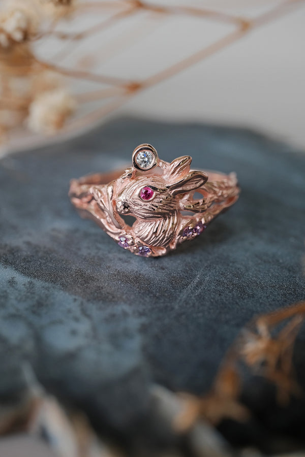 14K rose gold Lunar Hare engagement ring with diamond, ruby, and lavender sapphires - a symbolic animal design for women.