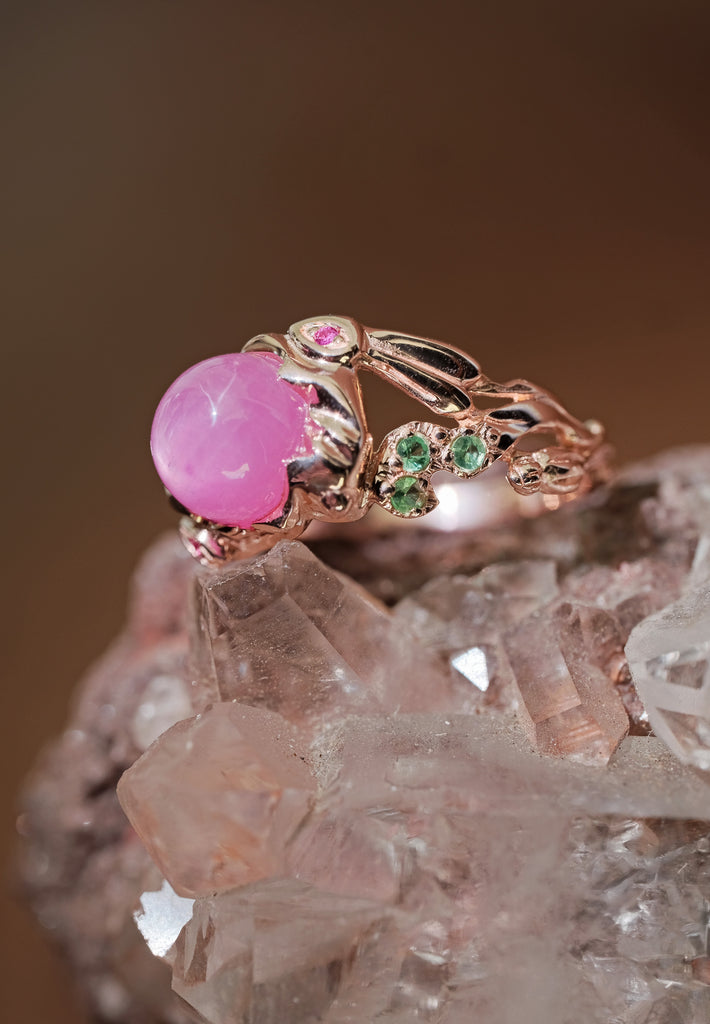 Rose gold star ruby ring with lunar hares, suitable for unique engagement styles.