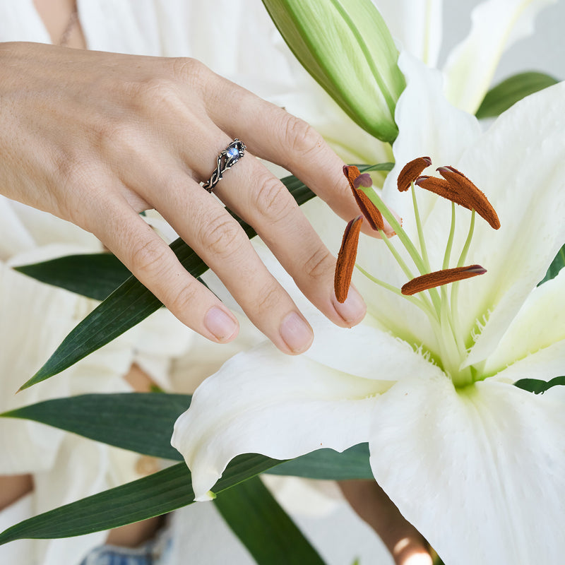 Moonstone engagement ring on the hand