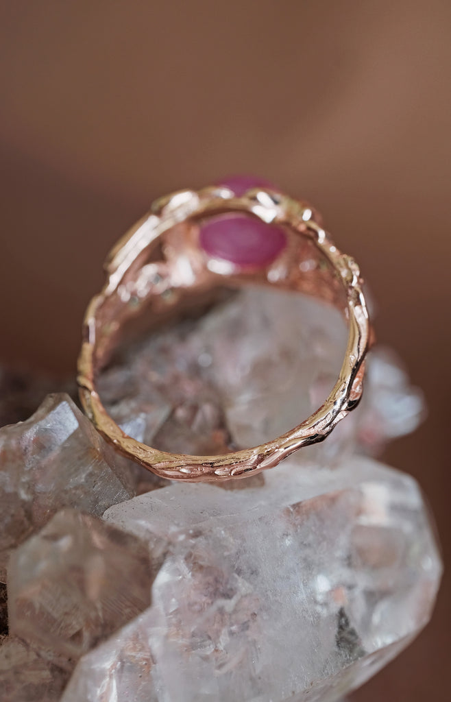 Magical organic rose gold ring with pink star ruby and carved lunar hares.