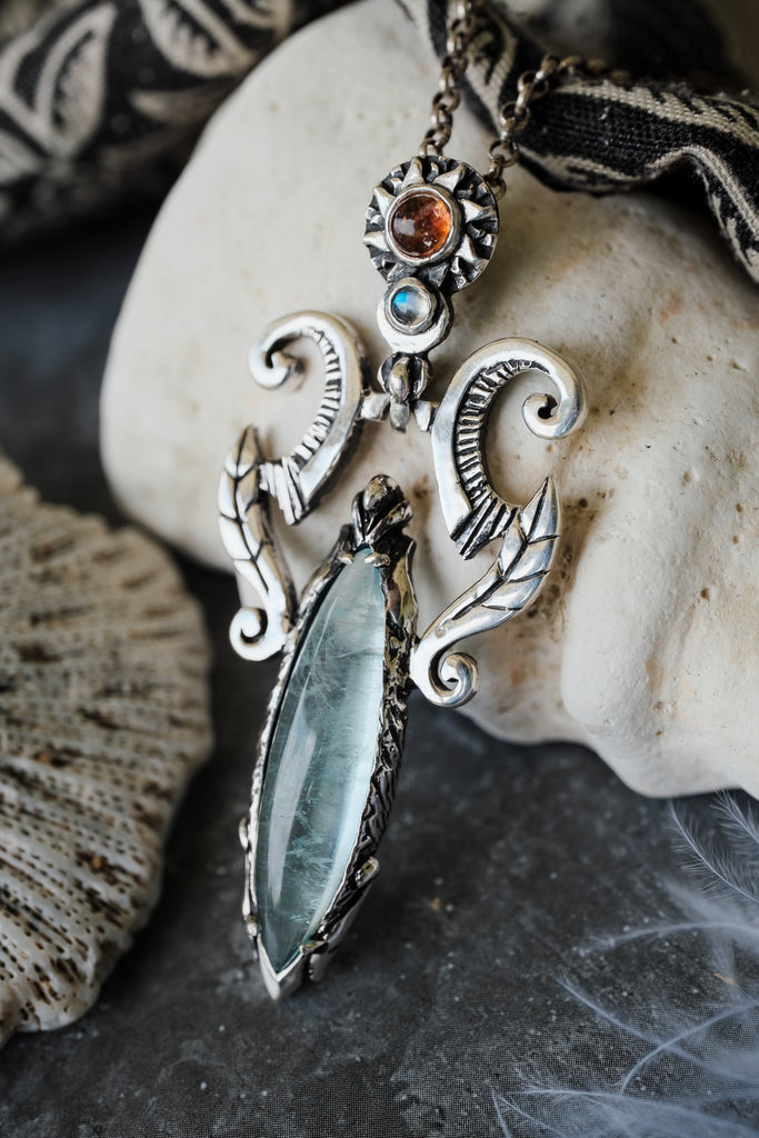 Aquamarine Necklace with Sun and Moon "Elaya"