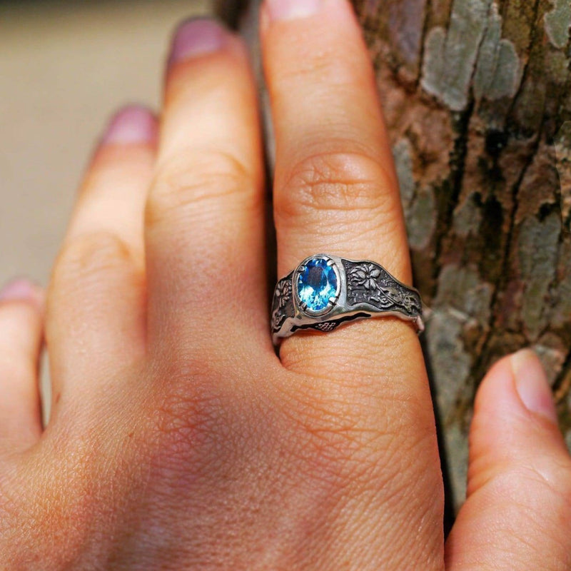 Swiss Blue Topaz ring «Mudra» with Buddha hand - blacktreelab