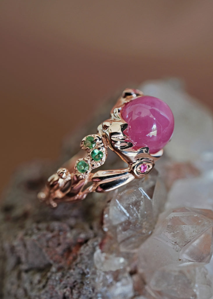 Whimsical and magical star ruby ring featuring symbolic lunar hares