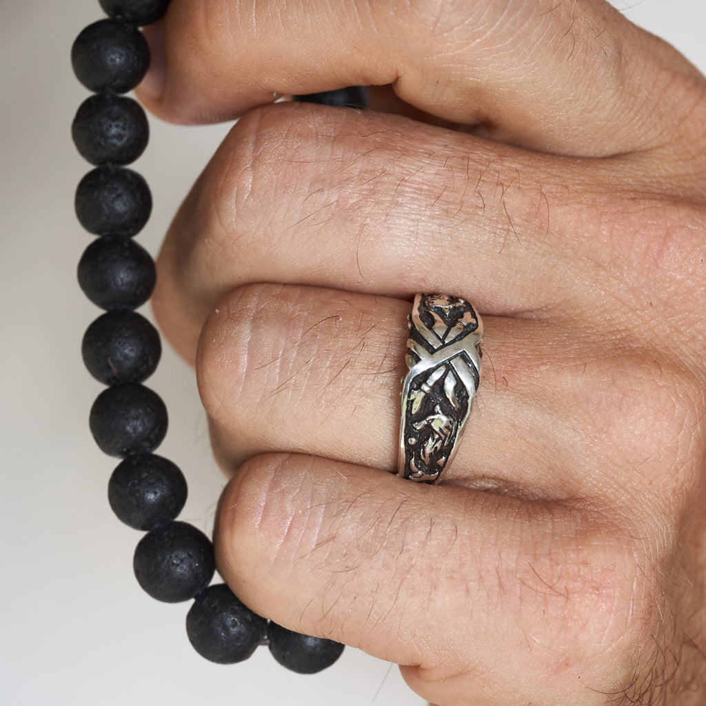 Men's wedding band "Wolf" on a man's hand