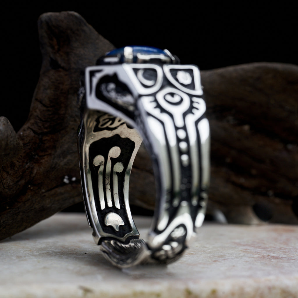Mens ring with snakes and Boulder fire opal “Shamania”